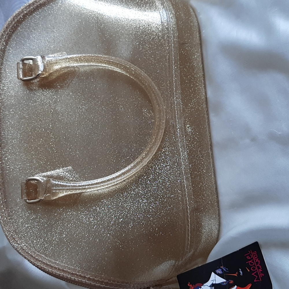 Purse. NEW vinyl see through gel  purse
